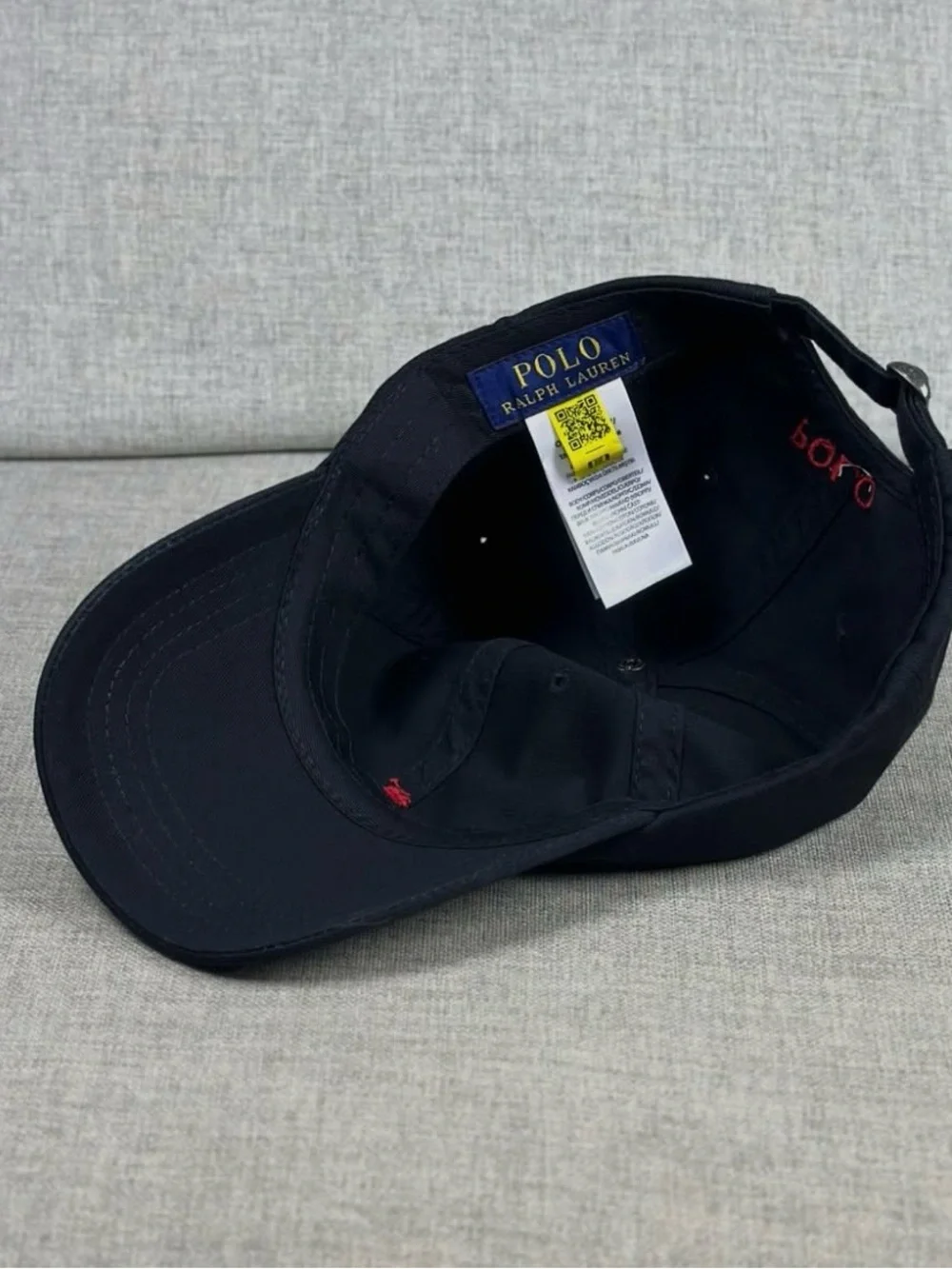 Polo Ralph Lauren black baseball hat with red logo, adjustable fit
